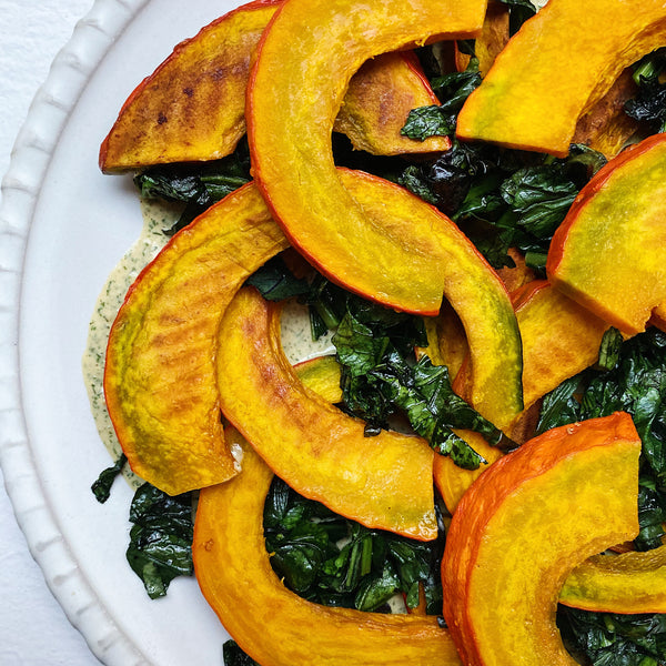 Roasted Kabocha Squash with Dill Sauce and Sautéed Purple Mizuna - Local Roots NYC