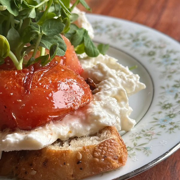 Burrata Toast with Sautéed Tomatoes and Pea Shoots